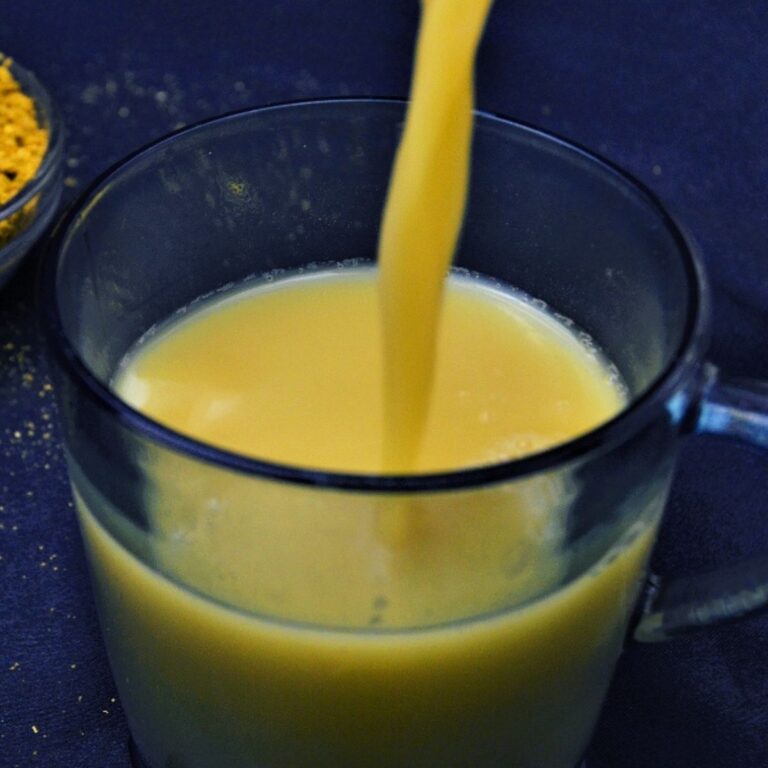pouring kashayam into the glass.