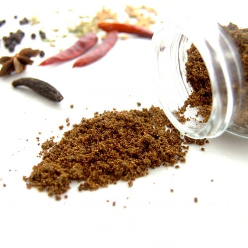 chettinad masala with spices on white table