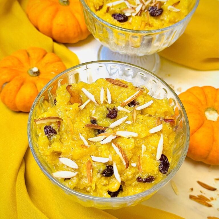 pumpkin halwa (kaddu ka halwa) served in a glass bowls garnished with raisins and nuts