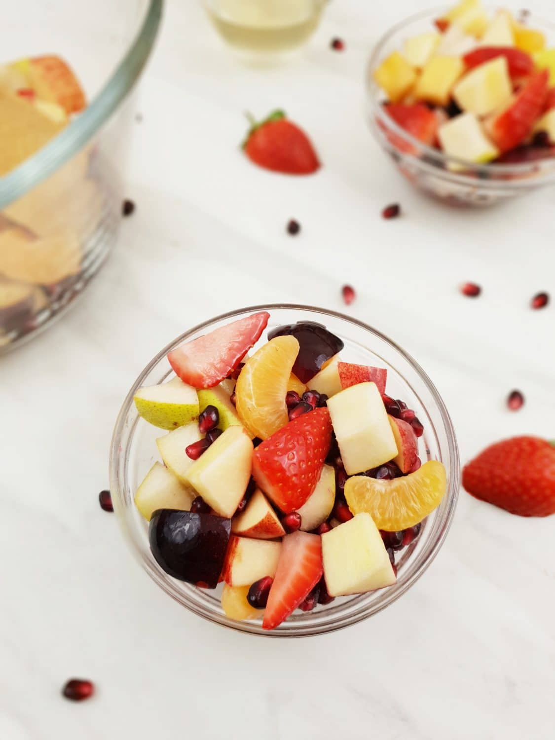 fruit salad with dressing in a bowl.