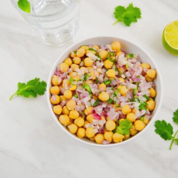 simple chickpea salad in a white bowl