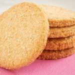 coconut butter cookies placed on pink napkin.