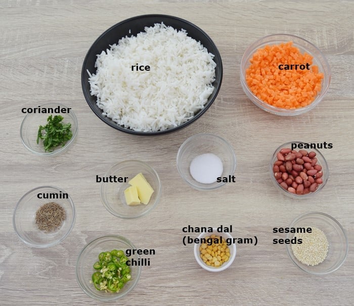 Ingredients to make carrot rice placed on a table.