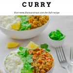 white bowl filled with white rice, chickpea and spinach curry with coriander and lemon wedge placed on white table along with 2 forks, pinch bowl of coriander and 2nd bowl of rice and curry behind with text overlay on top.