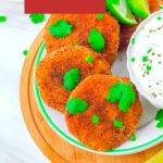 pin image of 4 sweet potato patties in a white side plate with a bowl of yogurt dip on wooden board with text overlay on red background.