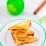 pin image of mini apple turnovers with pink text overlay on top and bottom.