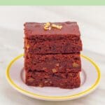 pin image of chocolate fudge brownies with text overlay on top and bottom on green background.