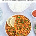 pin image of black eyed peas curry with black text overlay on top.