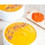 pin image of carrot lentil soup with green text overlay on top.