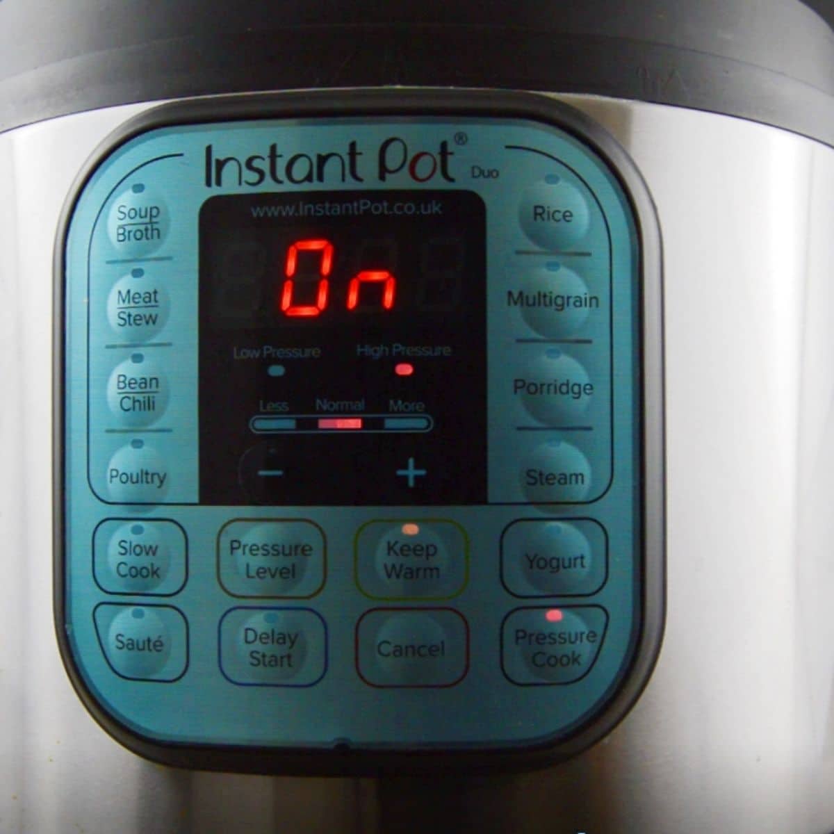 instant pot with pressure cook mode with ON on the display.