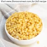 pin image of cooked wheat berries with a black text overlay on top.