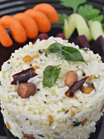 coconut rice in a plate with salad