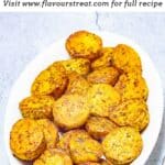 pin image of roast baby potatoes with black text overlay on top