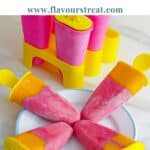pin image of mango cherry popsicles with blue text overlay on the top.