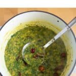 pin image of moringa dal with blue text overlay on the top.