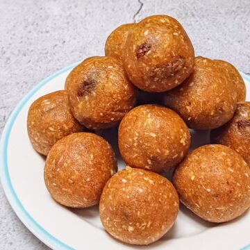 no bake almond flour energy balls on a plate.