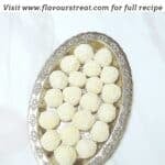 pin image of o bake coconut almond balls with black text overlay on the top.