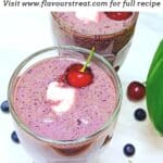 pin image of bluebery cherry smoothie with black text overlay on the top.