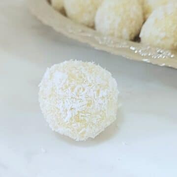 coconut almond flour ball placed on marble.