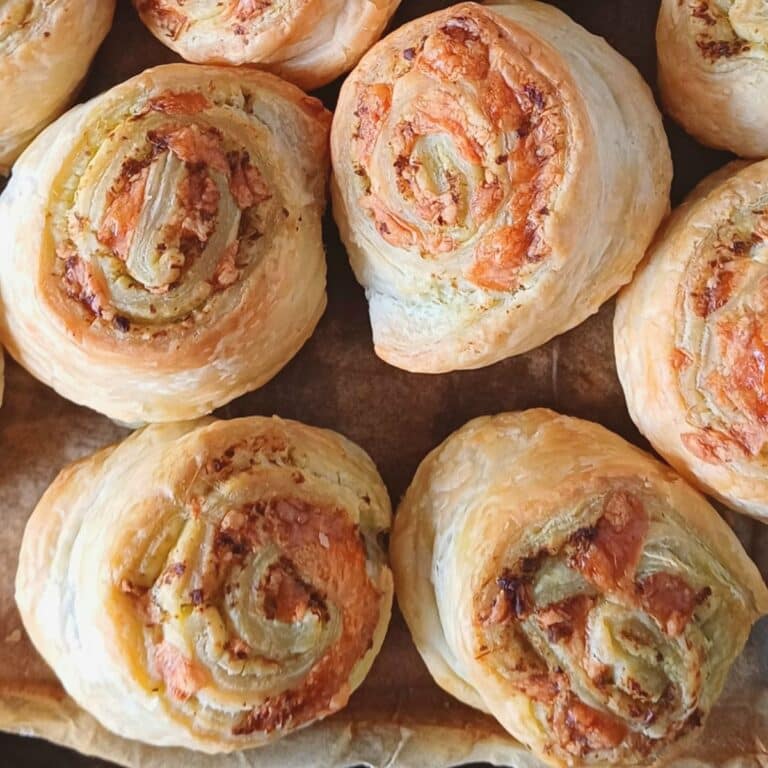 close up shot of pesto puff pastry pinwheels