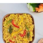 pin image of capsicum rice with text overlay on the top.
