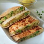pin image of potato peas quesadilla with text overlay on the top.