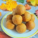 pin image of no bake pumpkin energy balls with text overlay on the top.