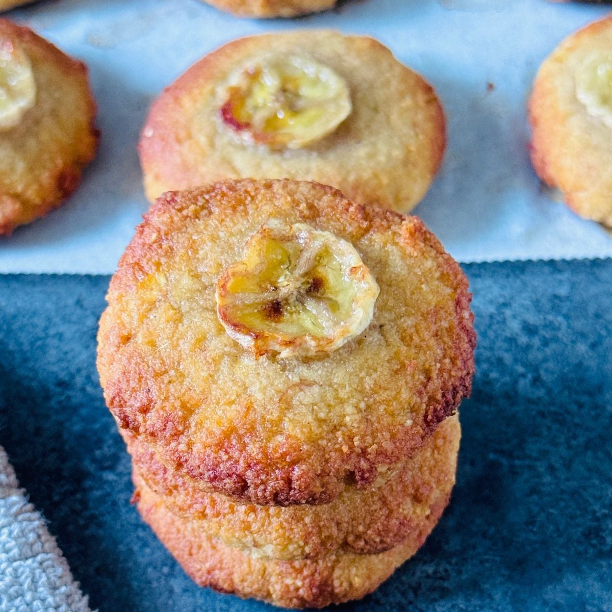 pin image of banana almond cookies with text overlay on the top.