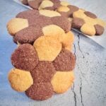 almond flour vanilla chocolate cookie placed on light coloured surface.