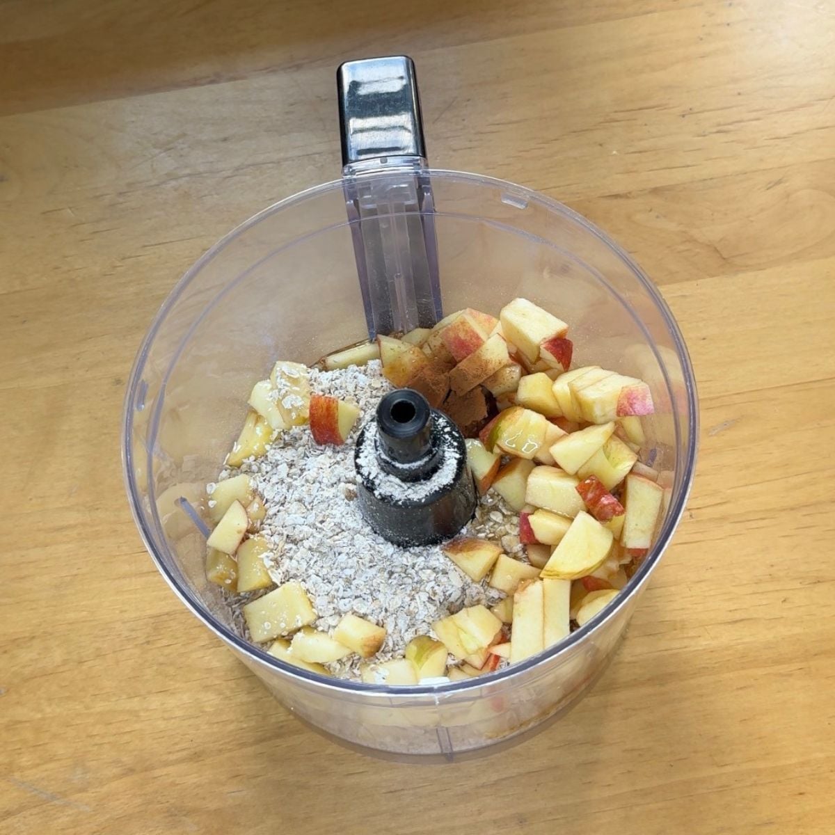 ingredients to make apple oat bars in a blender.